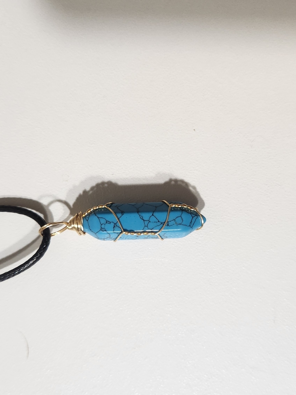 Turquoise Colored Stone Pendant Necklace with Gold Wire Wrap